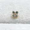 Pendientes de aleación de titanio ASTMF-13 flor de cuatro pétalos de circonita ultra brillante dorados Perforación de labio de circonita con rosca interna de titanio G23