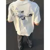 Camiseta masculina e feminina americana de alta qualidade com bordado floral de manga curta, novo top versátil de verão vintage com corte solto para casais
