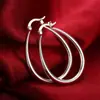 Pendientes lisos decorativos de plata de moda de eBay Amazon, pendientes creativos de Europa y Estados Unidos exagerados de comercio exterior, fabricantes al por mayor
