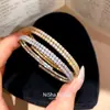 Pulsera circular envuelta en circonitas estilo francés, lujo ligero, alta gama, moderna y exquisita, joyería versátil elegante de nicho para mujer
