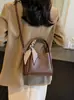 Bolso de Mano Retro Transfronterizo para Mujer 2025 Otoño e Invierno Nuevo Bolso de Hombro de Moda para Salir Bolso Cruzado Tipo Cubo Versátil