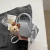 2026 Nuevo Bolso Cubo Retro para Viajes Diarios para Mujer Otoño/Invierno Gamuza Terciopelo Moda Simple Gran Capacidad Bolso Cruzado Madre-Hijo