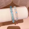 Pulsera de tres capas hueca con cuentas de vidrio de viento de segunda mano, sentido de diseño, personalidad, pulsera simple, lujo ligero, sensación de alta gama, joyería de mano para mujeres