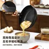 Suministrado directamente por el fabricante, Sartén Antiadherente Resistente a las Grietas para Uso Doméstico, Doble Pico, Apto para Cocinas de Inducción, Wok de Hierro Fundido con Fondo Plano, Venta al por Mayor