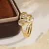 Anel de luxo novo modelo mais vendido em e-commerce transfronteiriço, banhado a ouro rosa, anel de prata com zircônia giratória inlay atacado