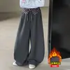 Pantalones Negros Niñas Invierno 2026 Estilo Niña Pantalones Falsos de Dos Piezas Cubre Pompas Otoño/Invierno Pantalones de Pierna Curva con Felpa para Niños Ropa de Abrigo
