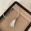 Nuevo collar étnico de borla de concha natural estilo chino, un diseño único y elegante para mujer, perfecto como cadena para suéter, y un accesorio deslumbrante