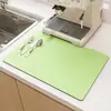 Tapete Drenante de Couro Absorvente de Água de Terra Diatomácea Transfronteiriço para Mesa de Cozinha Doméstica, Resistente a Manchas e Fácil de Cuidar, Pode Ser Personalizado e Enviado