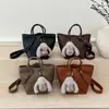 Bolsa Satchel Casual para Mulheres 2025 Inverno Nova Textura de Alto Padrão Estilo Estrangeiro Luxo Acessível Bolsa de Ombro Único Transversal