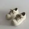 Venda Quente Estilo Coreano Bolo de Arroz Sola Grossa Sapatos Brancos Femininos Outono 2026 Novo Casual Versátil Aumentador de Altura Sapatos de Pão Board Femininos