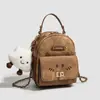 Bolsa de maternidad estilo 2026, mochila de moda para mujer estilo Melard, moderna y versátil
