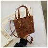 Bolso cubo de gran capacidad con textura casual 2025 nueva llegada bolso pequeño popular versátil estilo extranjero para ir al trabajo mano hombro