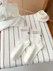 Calcetines sin costuras 2026 para mujer, calcetines de algodón de media pantorrilla para primavera con rayas bordadas en el talón, calcetines holgados estilo coreano sin costuras