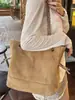 Bolsa de ombro retrô em camurça fosca com corrente para mulheres, início do outono de 2025, nicho, luxo leve e design de alta qualidade