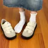 Zapatillas Casuales Blancas Versátiles de Diseñador Único Primavera 2026 Nuevos Zapatos Retro con Velcro Acolchados Zapatos de Entrenamiento Alemanes Zapatos de Skate