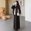 Roupa de maternidade outono 2026 novo estilo Conjunto de estilo francês para gestantes, um conjunto completo de duas peças de alta qualidade, suéter e calça, para outono e inverno