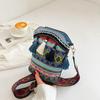 Bolso de Mujer Estilo Minoritario Super Fuego Bolso Balde 2022 Nueva Moda Bolso Bandolera de Hombro Casual de Viaje con Borlas