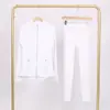 Conjunto de Chaqueta LULU DF con Cuello Alto y Pantalones Cropped con Logo, En Stock, Entrega Directa, Corte Delgado, Transpirable, Chaqueta Elástica con Cremallera Dorada