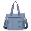 Bolsa de tela de nailon 2026 verano nuevo bolso de mujer urbano simple bolso de mano al hombro casual para damas bolso tote cruzado