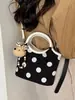 Bolso de Lunares para Mujer 2026 Nueva Moda de Verano Tendencia Bolso Cubo de Hombro Cruzado Único para el Trabajo y los Viajes