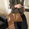 Bolso de hombro tipo tote vintage de gran capacidad, nuevo bolso cruzado de moda para ir al trabajo, otoño temprano 2026, bolso de mano casual, bolso de axila