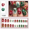 Nuevas uñas postizas con temática navideña: copos de nieve, árboles de Navidad, bastones de caramelo, regalos, arte de uñas navideño al por mayor