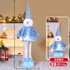 Nova Boneca de Natal em Pé Retrátil Velho de Listras Natalinas Boneco de Neve Boneca de Pernas Longas Decoração de Janela de Hotel