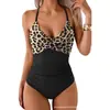Traje de baño de una pieza para mujer transfronterizo de comercio exterior, bolsa retorcida europea y americana, ajustado, cruzado, estilo popular de Amazon, traje de baño con bloques de color, bikini