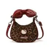 Bolsa de mano para niña con lazo de capullo de flor de mezclilla, estampado de leopardo, moderna, versátil, nicho de gato, princesa, monedero para niños, moderno