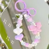 Cadena creativa para teléfono móvil con cuentas de mariposa UV estilo pequeño y fresco, llavero lindo con forma de corazón, colgante pequeño para bolso, accesorio