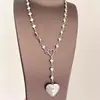 Collar con Borla de Corazón Tallado Vintage para Mujer Diseño de Nicho Transfronterizo Europeo y Americano Moda Versátil Cadena para Clavícula de Gama Alta