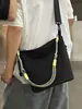 Bolso ligero y versátil de nailon para mujer, nuevo bolso casual cruzado y de hombro 2026, bolso tipo cubo súper popular para primavera y verano