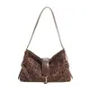 Bolso retro de alta gama transfronterizo de gran capacidad para mujer 2025 otoño e invierno nuevo diseño nicho moda casual bolso bandolera