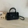 Bolsa de Mão Simples Estilo Coreano Transfronteiriça Feminina 2026 Nova Moda Casual Bolsa de Ombro Único Versátil para o Trabalho Bolsa Transversal