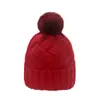 Amazon transfronterizo otoño e invierno Nuevo gorro de lana color liso combinable cálido pompón de pelo gorro para el frío trenza Gorro de punto a cuadros para mujer