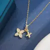 Collar con cadena en O de diseño de nicho color dorado con colgante de trébol de cuatro hojas de flor doble full-diamond, el más vendido de Amazon para mujer