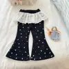 Pantalones Acampanados Elegantes para Niñas Pequeñas Primavera 2026 Nuevo Estilo Niña Bebé Estilo Coreano Pantalones Largos de Encaje Primavera/Otoño Pantalones Deportivos Versátiles