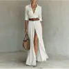 Vestido de verano para mujer estilo europeo y americano, cuello en V, abertura larga, color liso, adelgazante, estilo vacacional, vestido tipo camisa con diseño de cinturón, 2026