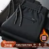 Pantalones casuales de otoño e invierno, forrados de polar y engrosados, pantalones rectos para hombre, corte holgado con cordón, pantalones largos versátiles, pantalones cálidos de invierno para hombre