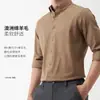 Nova Camisa Masculina de Lã Outono 2026 Casual Quente Negócios Gola Button-Down Moda Cor Sólida Camisa Masculina
