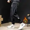 Calça Jogger Masculina com Forro de Fleece para Outono e Inverno, Calça Casual Solta Versátil, Calça Longa Grossa de Veludo Cotelê Quente para o Inverno