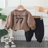 Conjunto de Dos Piezas Estilo Inglés para Niños y Niñas Bebés, Conjunto de Sudadera para Niños 2026 Primavera y Otoño, Nuevo Modelo Elegante para Bebés