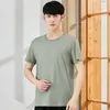 Nueva camiseta de primavera y verano 2021 para hombre, sudadera juvenil, color liso, camiseta básica, cuello redondo, manga corta, camiseta para hombre al por mayor