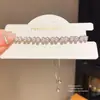 Pulseira retrátil de flor com zircônia metálica e madrepérola, pulseira de pulso fresca e fashion para o verão, joia requintada, luxo leve, de alta qualidade