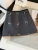 Saia de lã moderna estilo coreano com lantejoulas para mulheres, nova saia curta evasê outonal anti-exposição para mulheres baixinhas