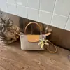 Bolsa de Dumpling de Moda para Vacaciones en la Playa de Verano 2026 Bolso Cruzado Pequeño Cuadrado Tejido a Mano de Nicho para Mujer