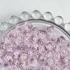 Bolsa de material para uñas con flores de simulación, venta al por mayor, con explosiones luminosas en vivo, nubes y rosas moradas.