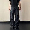 Pantalones anchos plisados de nuevo estilo minimalista para hombre 2026, cintura con cordón gris verdoso de verano, corte holgado, piernas anchas, pantalones largos casuales