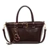Bolsa de Mão Retrô Nicho Estilo Coreano Feminina 2026 Nova Leve Luxuosa Tendência Moda Bolsa de Ombro Único Versátil Casual Bolsa Transversal
