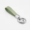 Llavero Popular Transfronterizo para Coche de TPU Colgante de Anillo de Llave de Aleación de Zinc Llavero con Borde Dorado de TPU Venta al Por Mayor de Fábrica